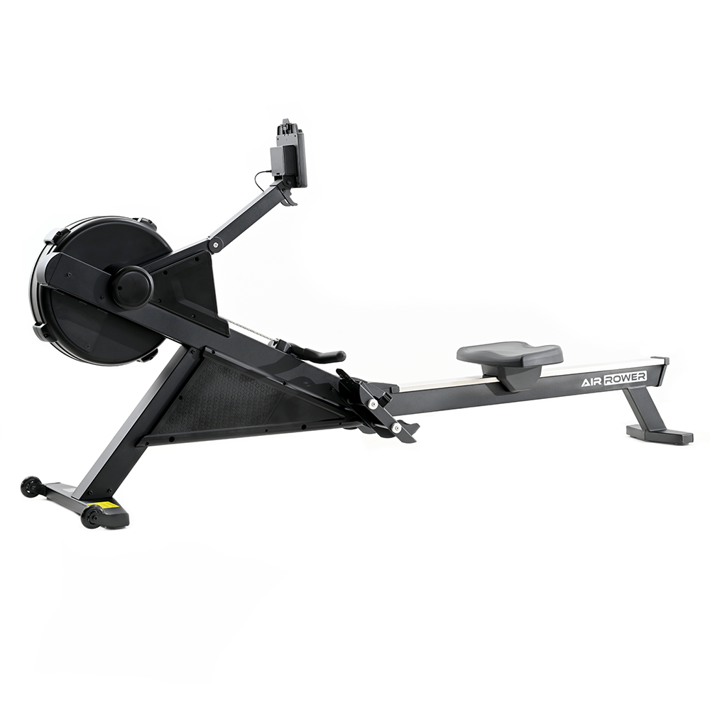 a black exercise machine with a white background